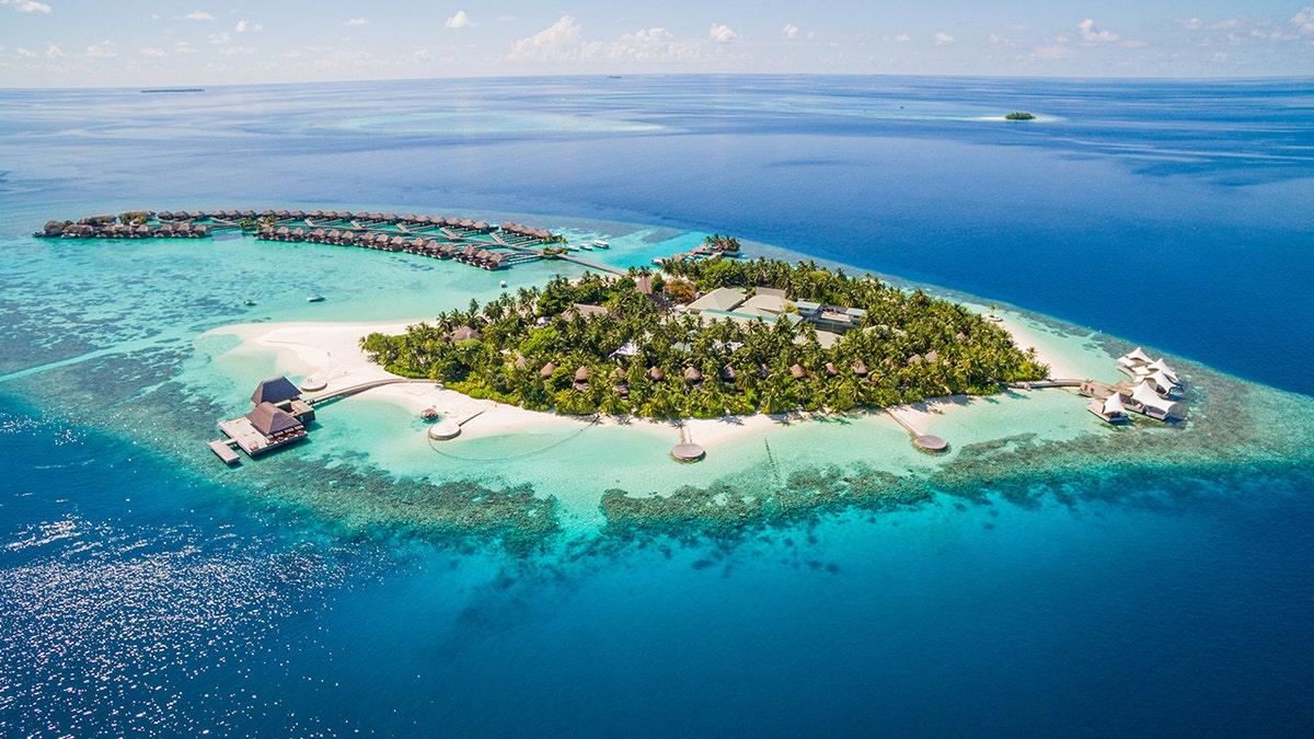 Smoking banned for entire generation under sweeping new national law Aerial shot of the Maldives, island surrounded by ocean