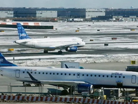 JetBlue flight makes emergency landing at Tampa Airport after sudden 'drop in altitude' injures passengers JetBlue flight makes emergency landing at Tampa Airport after sudden 'drop in altitude' injures passengers