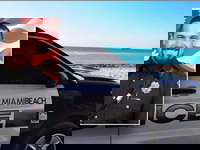 Miami Beach commissioner to donate salary to family of fallen police officer Miami Beach police office David Cajuso and a photo of a police vehicle on the beach.