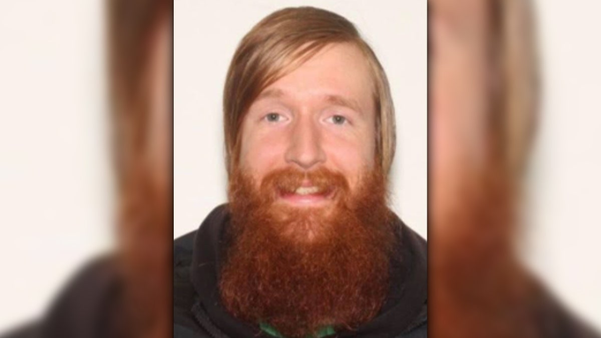 Michael Parker, 28, is accused of ambushing police officers in Lorain, Ohio, killing one and injuring two. He was shot and killed by police during the gunfire exchange.