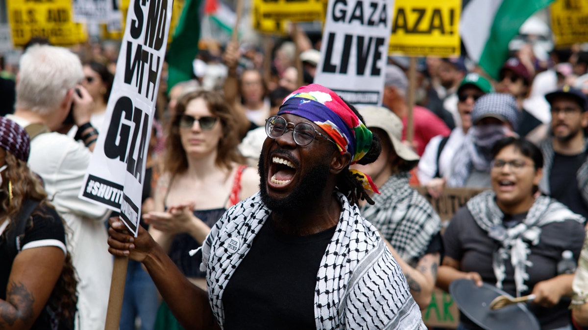 People chant slogans during the 