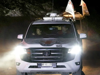 Hamas hands over another Israeli hostage's remains as Gaza ceasefire exchanges continue Red Cross vehicle driving